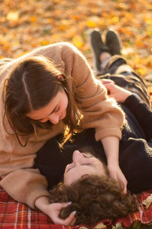 Happy couple outdoors. Outdoor portrait of romantic couple in love. Full of happiness. Valentines Dayの写真素材
