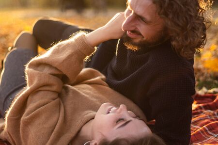 Happy couple outdoors. Outdoor portrait of romantic couple in love. Full of happiness. Valentines Dayの写真素材