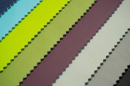 Catalog of multicolored imitation leather from matting fabric texture background, leatherette fabric...