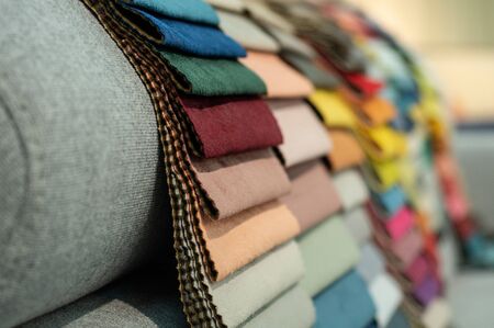 Upholstery fabric samples. Fabric for a furniture upholstery. Textile industry background.