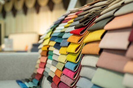 Upholstery fabric samples. Fabric for a furniture upholstery. Textile industry background.