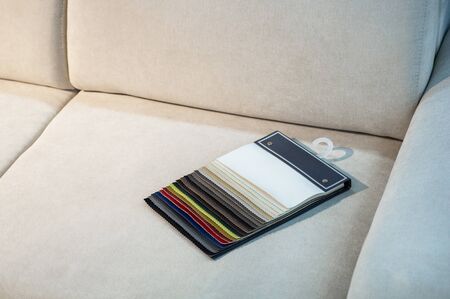Catalog of multicolored imitation leather. Leatherette samples texture. Industry background.