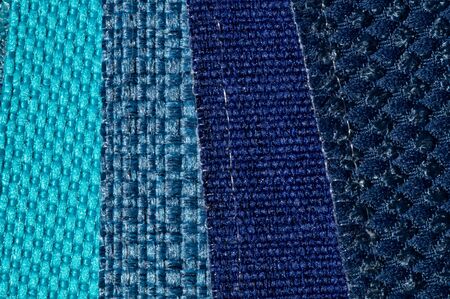 Catalog of fabric in blue turquoise shades. Fabric sample. Industry background. Texture