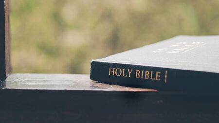 The Holy Bible. Reading the bible.  Concept for faith, spirituality and religion.の写真素材