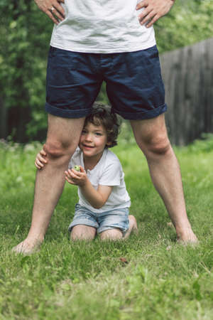 Father and his son playing and hugging in outdoors. Concept of Father's day. Happy loving family.の写真素材