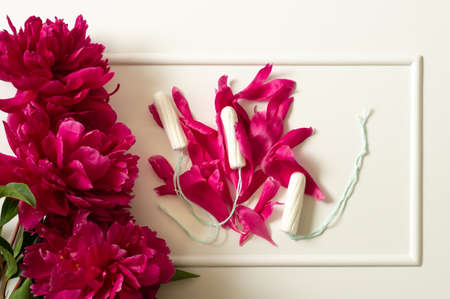 Tampons. Menstruation period concept. Hygienic white tampon for women. Menstruation, protection.