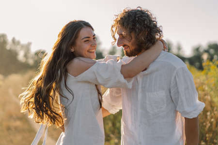 Happy summer. A loving couple together in nature. Happy vacation. Family recreation. Enjoyment and...