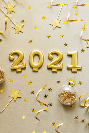 Happy New Years 2021. Christmas background with golden decorations, baubles, confetti. Christmas holiday celebration, winter, New Year concept.の写真素材