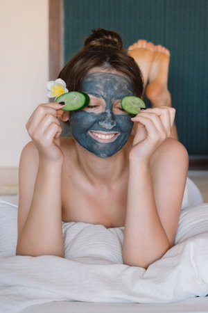 Beautiful Woman getting facial care. Spa relaxation concept.の写真素材
