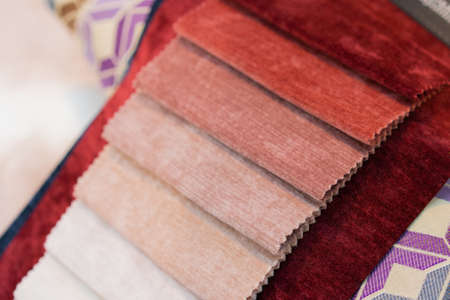 Tissue catalog. Catalog of multi-colored fabric samples. Textile industry background.の写真素材
