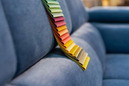 Tissue catalog. Catalog of multi-colored fabric samples. Textile industry background.の写真素材