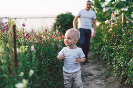 Father and his son playing and hugging in outdoors. Concept of Father's day. Happy loving family.の写真素材