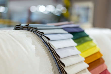 Catalog of multicolored cloth from matting fabric texture background, silk fabric texture, textile industry background.の写真素材