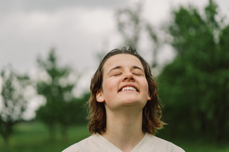 Close-Up Portrait Of Teenager Girl. Happy Cheerful Teen Girl With Pronounced Face From Sprayed Small...