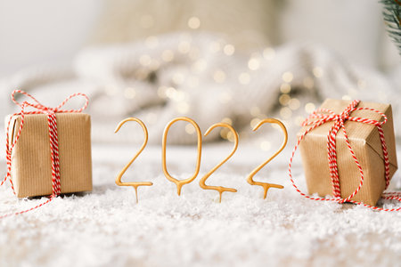 Happy New Year 2022. New Year background with presents, garlands and New Year decorations.の写真素材