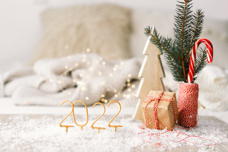 Happy New Year 2022. New Year background with presents, garlands and New Year decorations.の写真素材