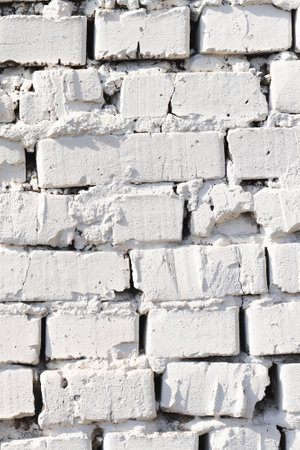 White brick background. Grunge texture is white brick. White old plaster on the wall.