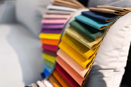 Catalog of multi-colored fabric samples. Textile industry background. Colored cotton fabric. Paletの写真素材
