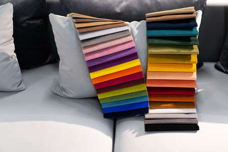 Catalog of multi-colored fabric samples. Textile industry background. Colored cotton fabric. Paletの写真素材