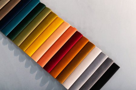 Catalog of multi-colored fabric samples. Textile industry background. Colored cotton fabric. Palet