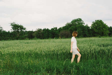 Happy Cheerful Teen Girl With Pronounced Face dancing In Outdoors.の写真素材