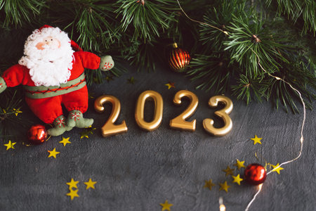 Happy New Years 2023. Christmas background with cone tree and Christmas decorations.の写真素材