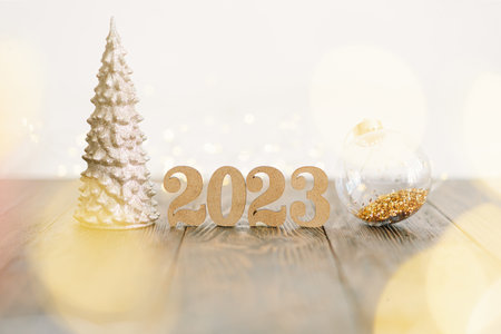 Happy New Years 2023. Christmas background with fir tree, cones and Christmas decorations