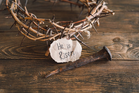 He is Risen. Jesus Crown Thorns and nails and cross on a wood background. Easter Dayの写真素材