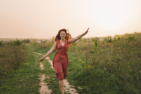 Portraits of a charming red-haired woman with a cute face.の写真素材