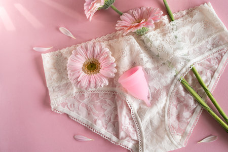 Silicone menstrual cup. Womens health and alternative hygiene.の写真素材