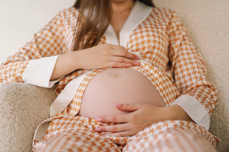 Belly of pregnant woman. Close-up belly of a pregnant woman.の写真素材