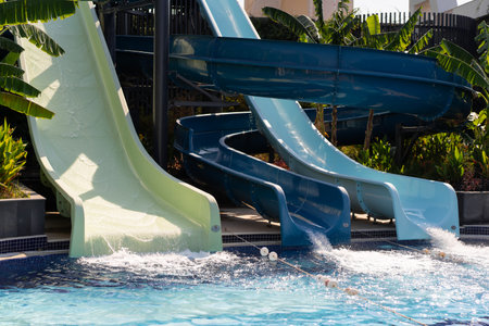 Blue swimming pool with water slide