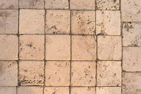 Close-Up View of Stone Paving Blocks in Natural Lightの写真素材