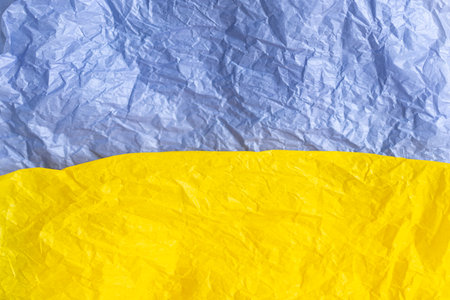 Paper in blue and yellow colors of the flag of Ukraine, UA. Blue and yellow colors.