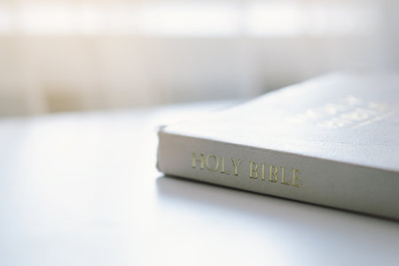 A Christian reads the Bible and drinks coffee. Religion concept.の写真素材