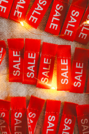 Cozy sweater adorned with holiday tagsの写真素材