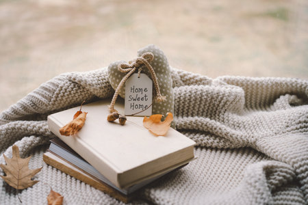 Still life details in home. Cozy home decoration with a heart-shaped tagの写真素材