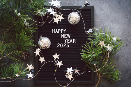 Happy New Years 2025. Christmas background with cone tree and Christmas decorations.の写真素材