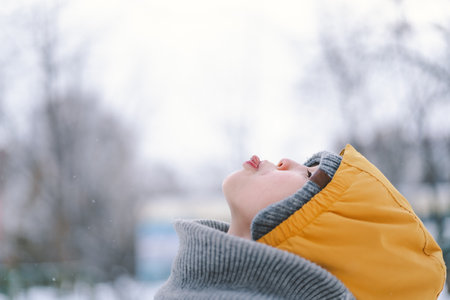 Portrait of a happy boy in winterの写真素材