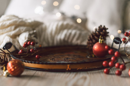 Festive holiday decor arrangement featuring cozy winter elementsの写真素材