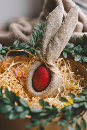 Easter decoration featuring colorful eggs arranged in a cozy nestの写真素材
