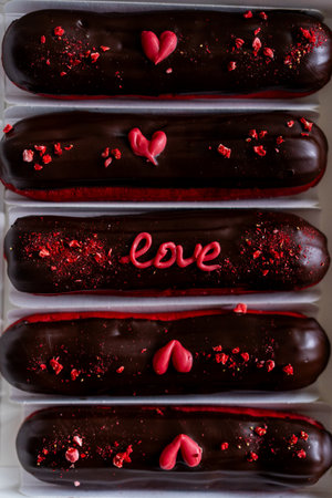Delicious chocolate eclairs for Valentines Day.の写真素材