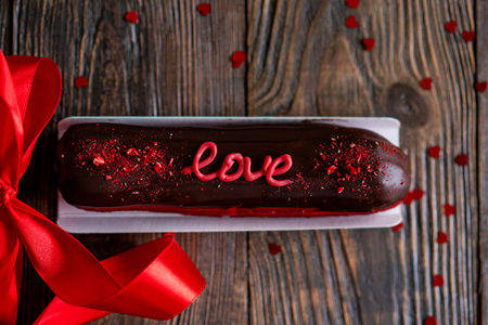 Delicious chocolate eclairs for Valentines Day.の写真素材