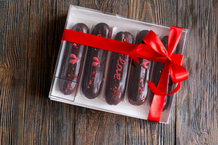 Delicious chocolate eclairs for Valentines Day.の写真素材