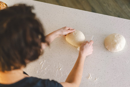 Preparing dough for baking. Healthy sourdough breadの写真素材