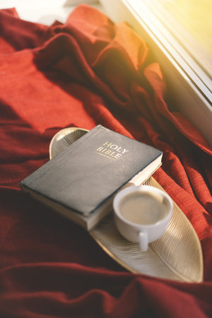 Reading the Holy Bible in home. Concept for faith.の写真素材