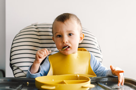 Little child with solid nutrition.の写真素材
