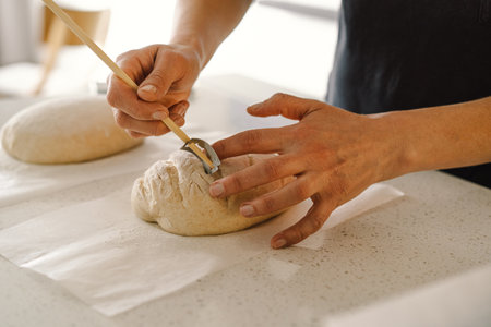 Woman preparing sourdough bread at home
