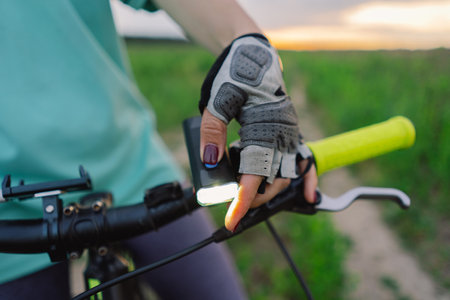 Close Up of a Womans Hand on a Mountain Bike Handlebars