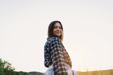 Portrait of a teenage girl on the field.の写真素材